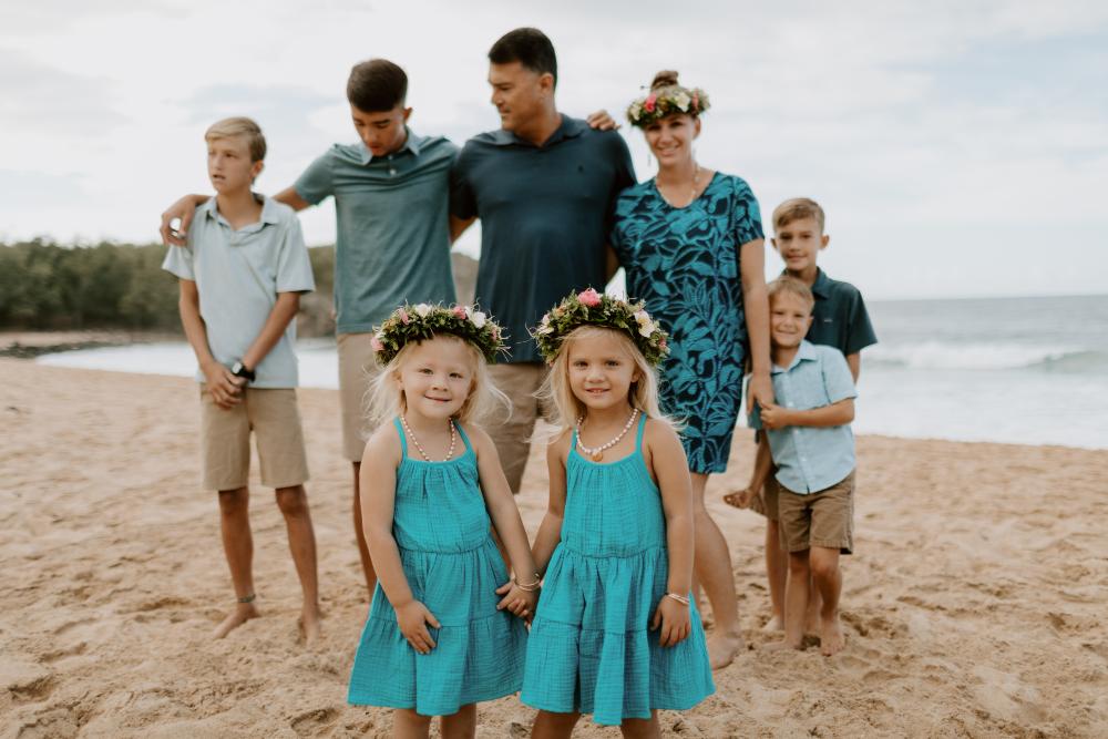 Dr Lutwin and his family on the beach